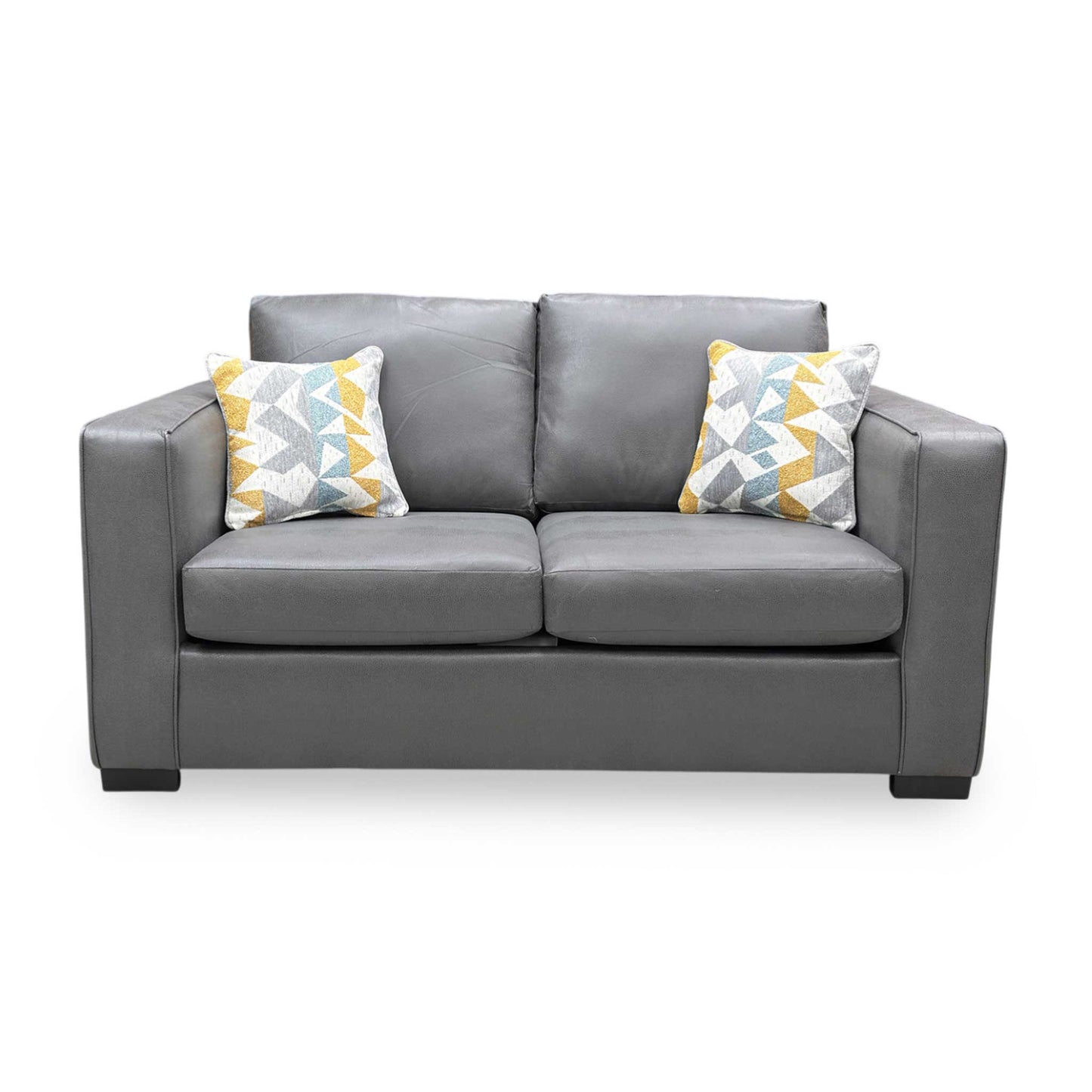 Front view of Grey snake faux leather Newton sofa bed styled in a contemporary living room, highlighting its compact and functional silhouette.