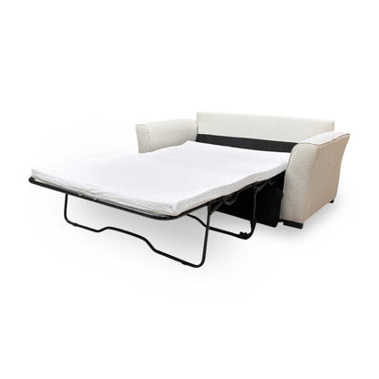 Side view of the solid wooden feet and sturdy base construction of the Albany cream fabric sofa bed.