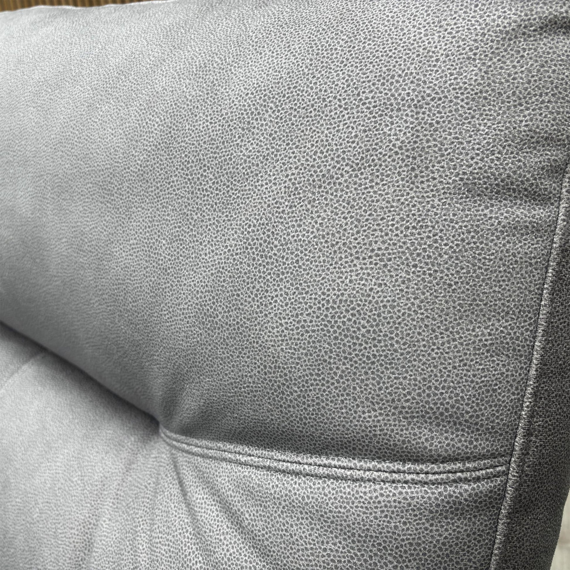 Close up view of the Stingray charcoal grey velvet fabric, showcasing its soft texture and high-quality finish.