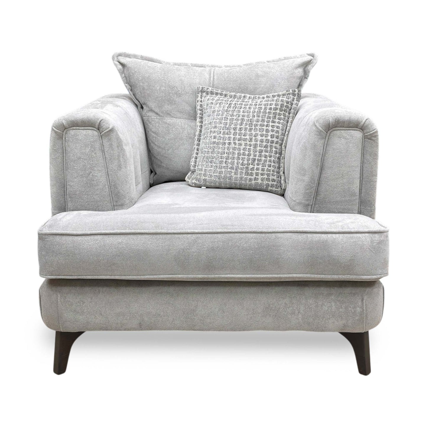 Front profile of the Farrah armchair, emphasizing the graceful angle of the backrest and the tailored finish of the silver fabric upholstery.