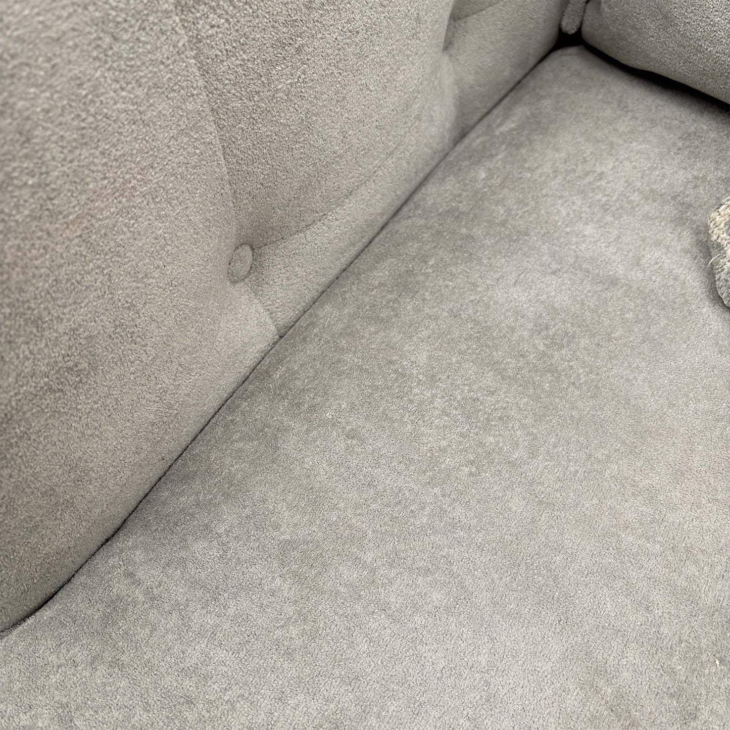 Close-up of the Riga Silver and Zena Silver fabrics, highlighting the intricate weave patterns, soft-touch finish, and premium tonal stitching.