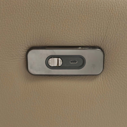 Close-up of the discrete power recliner buttons on the side of the sofa seat for effortless control of the motorized sections.