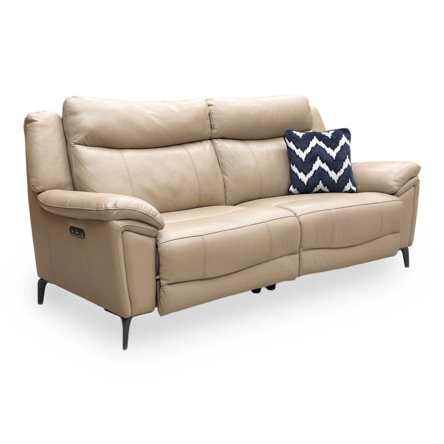 Side profile of the cream leather sofa, showing the modern open-base look and slender metal leg detail.