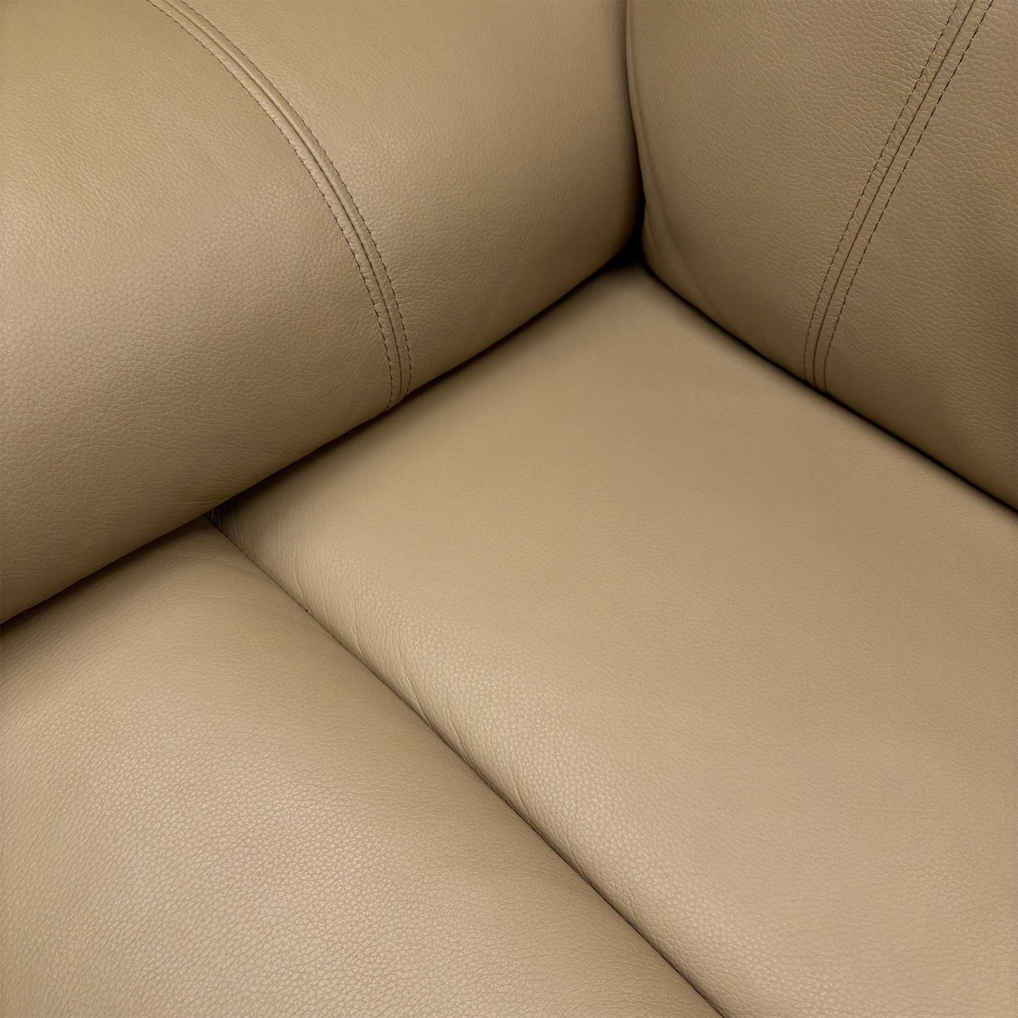 Close up texture shot of the soft Cream Barley Cat-60:06 100% genuine leather upholstery.
