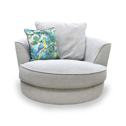 Front view of the silver swivel chair emphasizing the ergonomic depth and supportive sprung seat design.