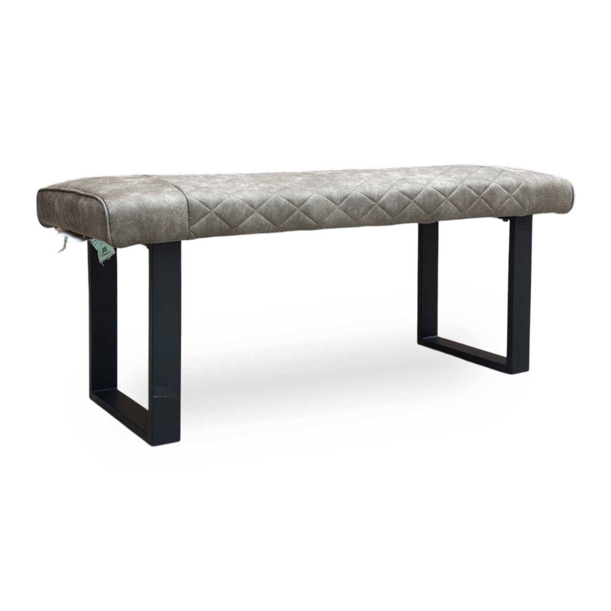 Full view of Modern Warrior dining bench upholstered in soft taupe fabric with elegant diamond quilted-effect stitching.