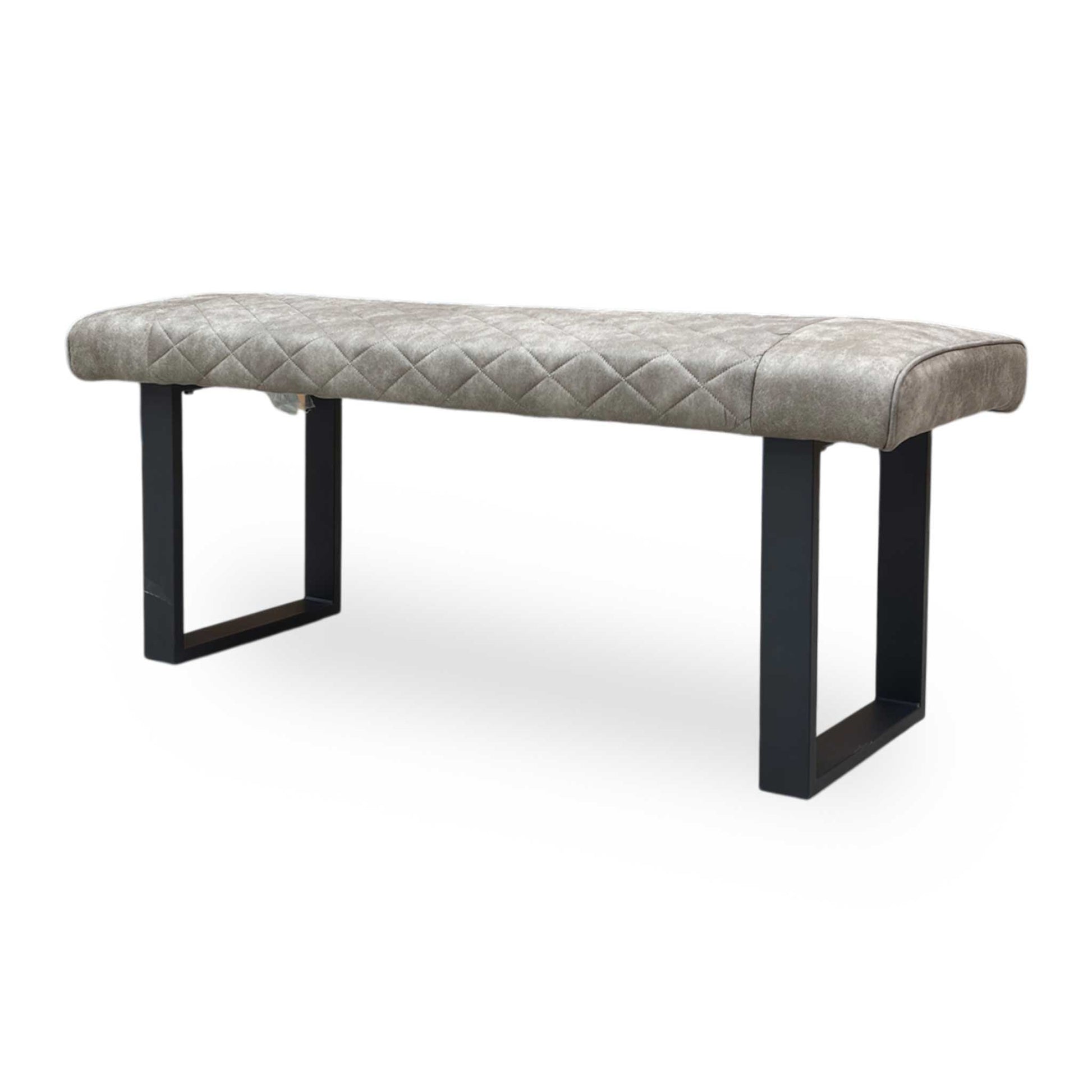 Side profile of the Warrior dining bench emphasizing the ergonomic seat thickness and angled metal leg frame.