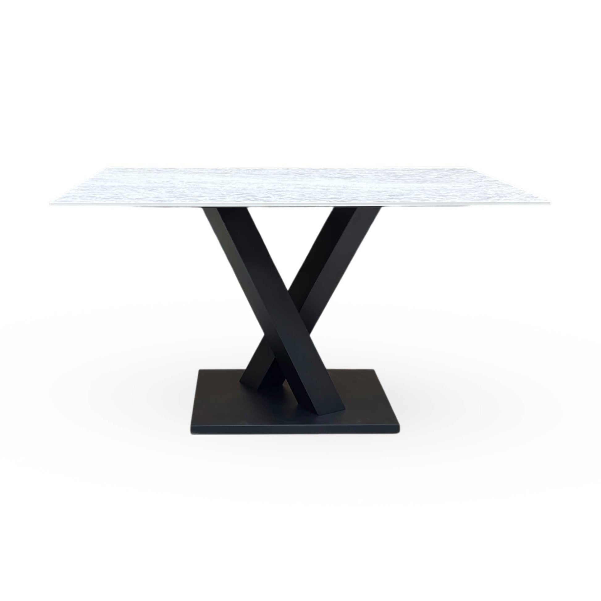 Front-facing view of the 135cm Warrior dining table, showcasing the sleek profile and durable sintered stone construction.