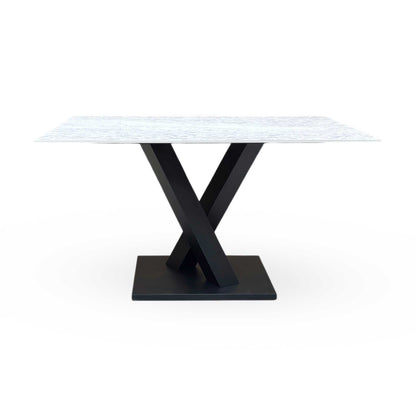 Front-facing view of the 135cm Warrior dining table, showcasing the sleek profile and durable sintered stone construction.