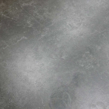 Macro shot of the sintered stone edge, illustrating the high-quality ceramic material and heat-resistant construction.