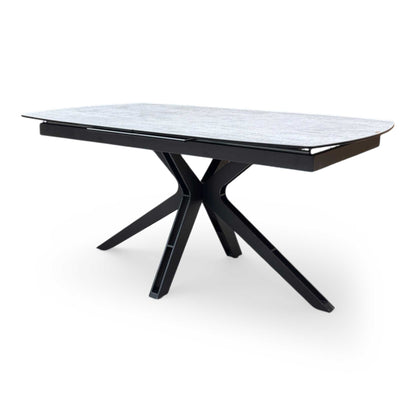 Side profile view of the table, emphasizing the slim tabletop profile and sturdy metal base construction.