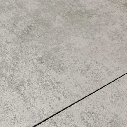 Close-up of the silver ceramic surface, showcasing the scratch-resistant and heat-resistant textured finish.