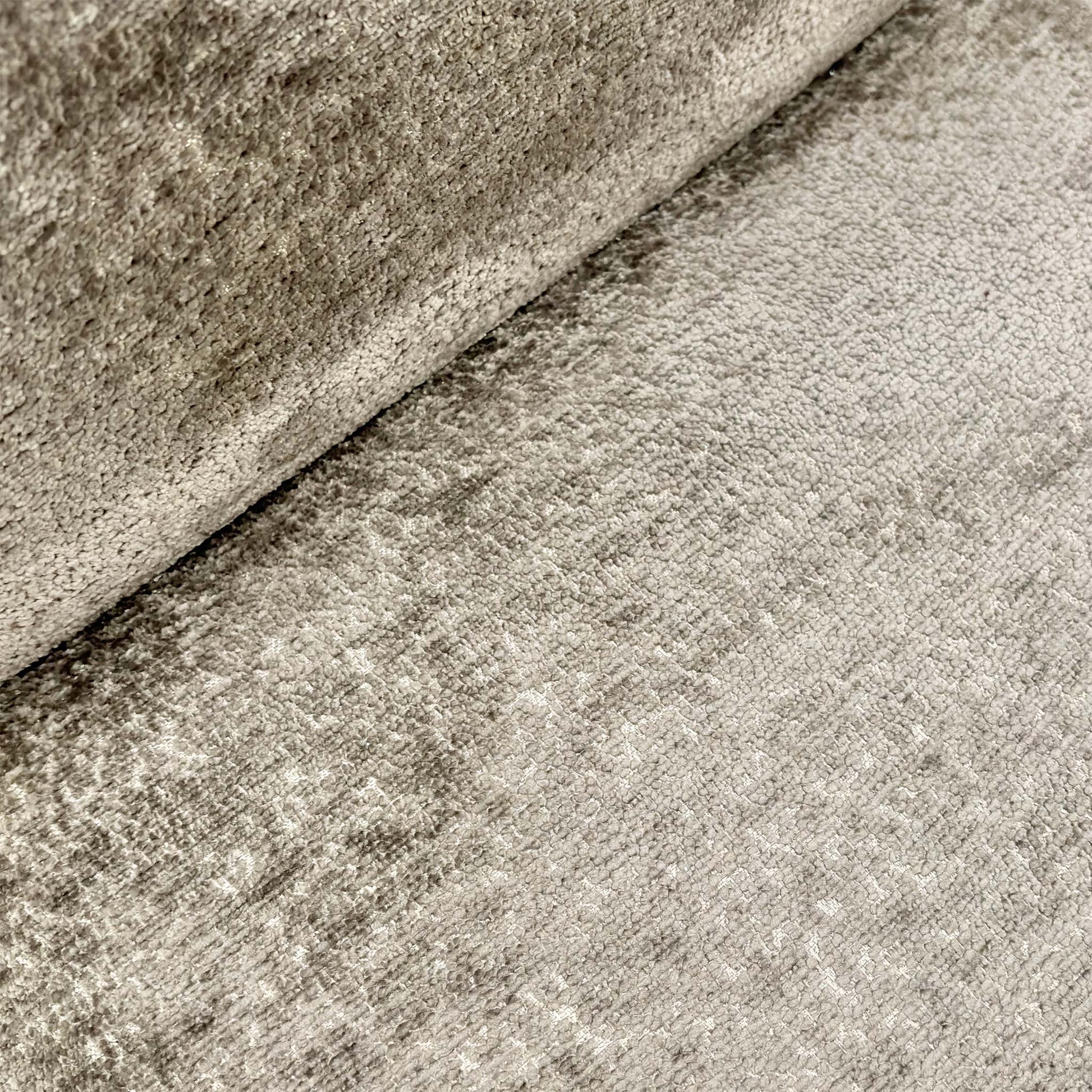 Close-up of the chair’s backrest, highlighting the central horizontal groove and elegant pinched seam stitching along the edges.