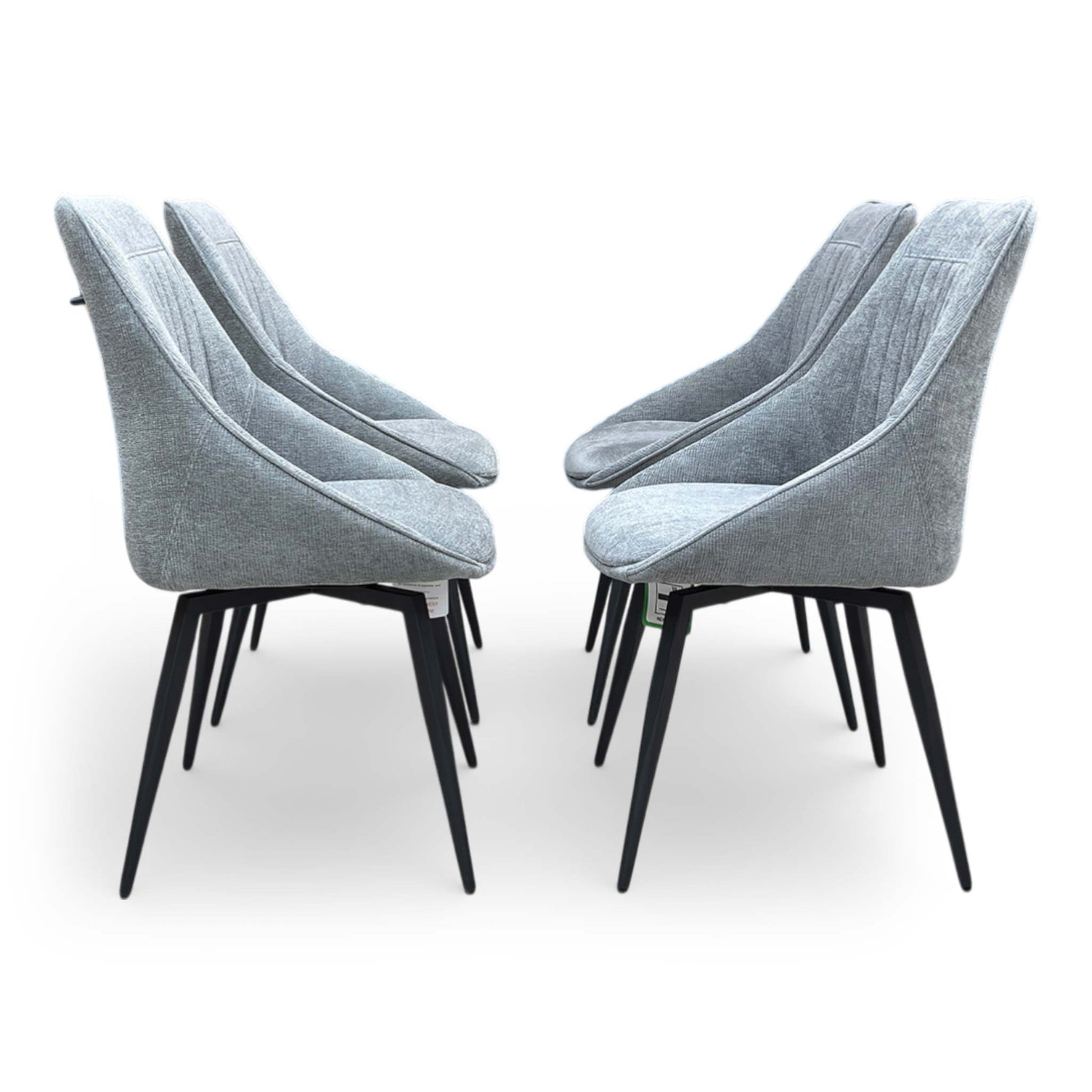 Front-facing view of a single Crete dining chair in Dark Grey fabric, highlighting the stylish vertical fluting and deep foam cushioning for added comfort.