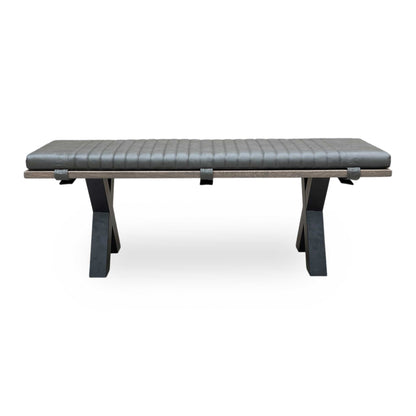 Front view of dining setup featuring the Loki solid oak bench with X-shaped legs.