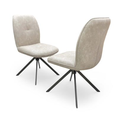 Back view of the Perla chairs demonstrating the clean lines and sleek modern silhouette.
