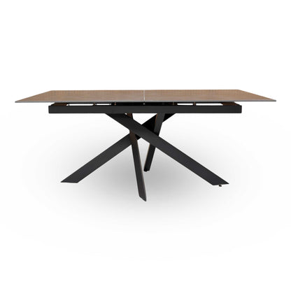 front view of The Warrior dining table fully extended to 220cm, illustrating the hidden pop-up leaf mechanism.