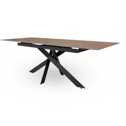 Side profile of the table demonstrating the sleek, tough sintered stone surface and sturdy leg construction.