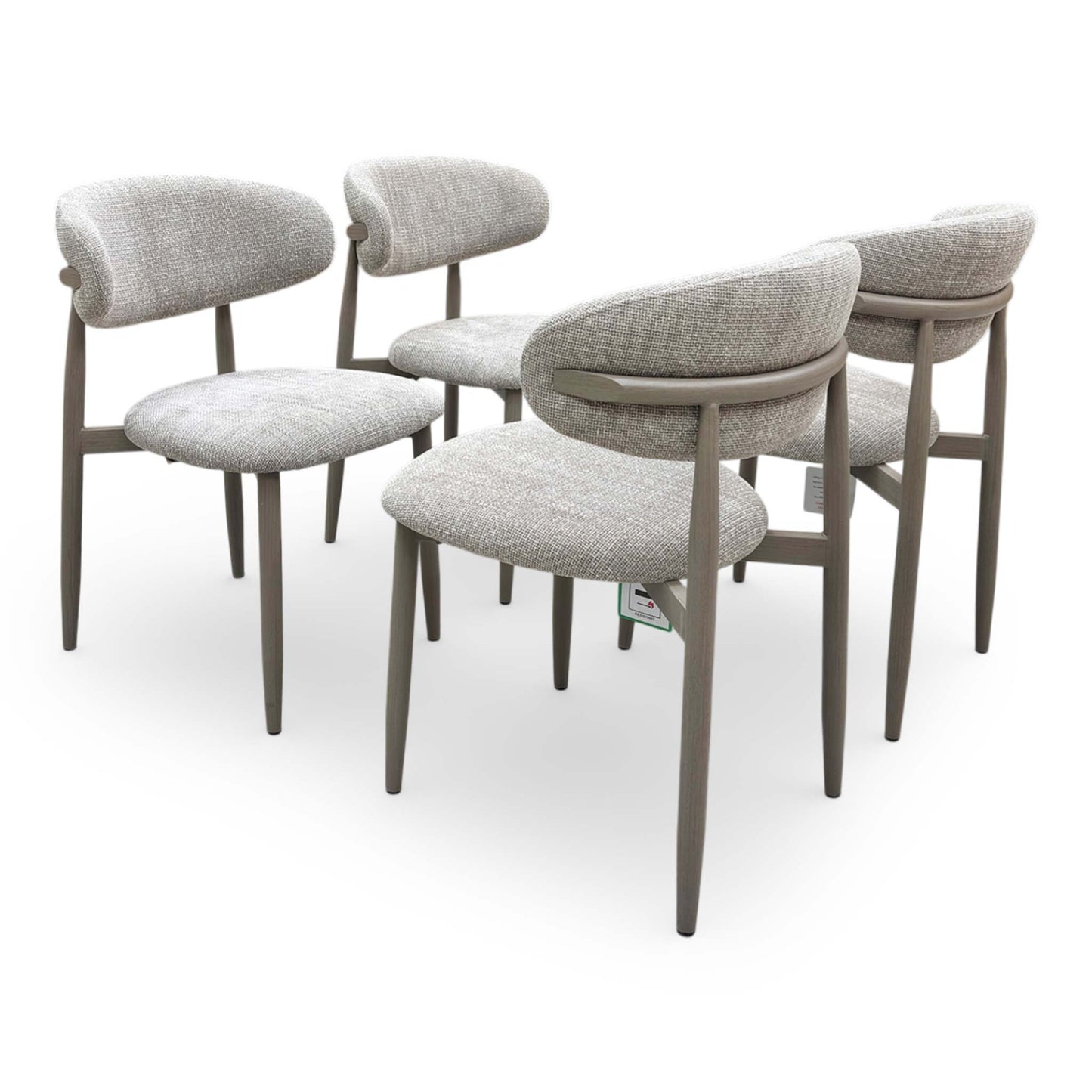 Full view Set of four Aimar dining chairs in oatmeal fabric, featuring a curved open-back design and dark wood legs.