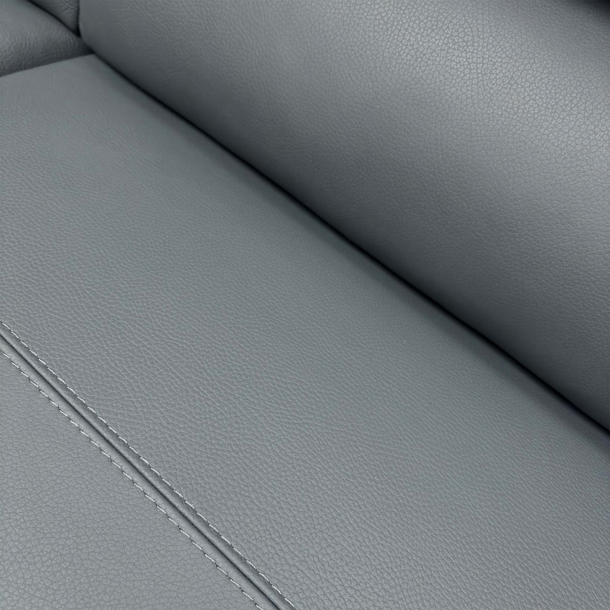 Close-up of the petrol blue leather texture, showcasing the durable 2597 leather finish and quality stitching details.