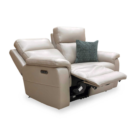 Full view of the Furniture Village ‘Raven’ Oslo 2-seater power recliner sofa in Oyster Cat-40:08 leather, featuring a compact design with high back support and padded armrests.