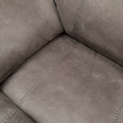 Close-up of the grey suede fabric texture, illustrating the soft-touch finish and high-quality tailoring of the upholstery.