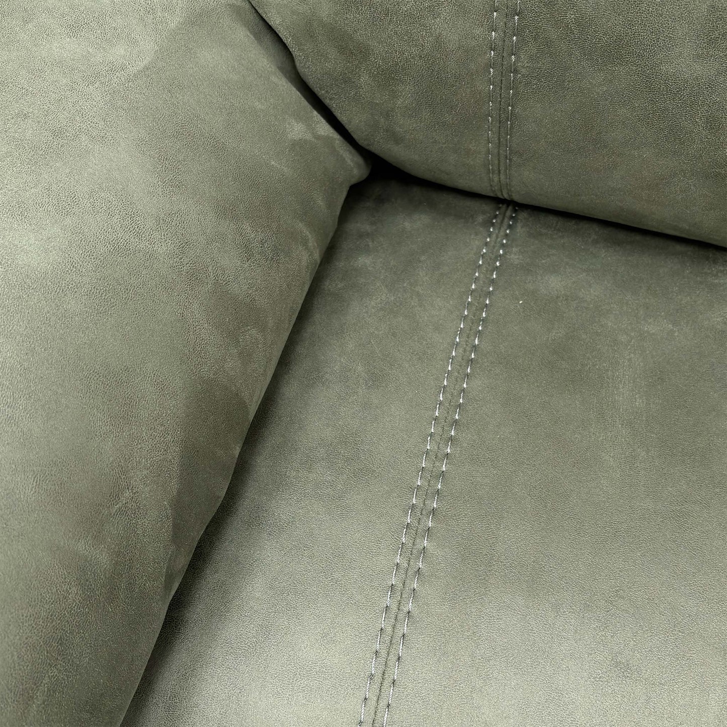 Close-up of the Olive Green suede fabric texture, highlighting the soft-touch finish and the rich, earthy green hue of the upholstery.