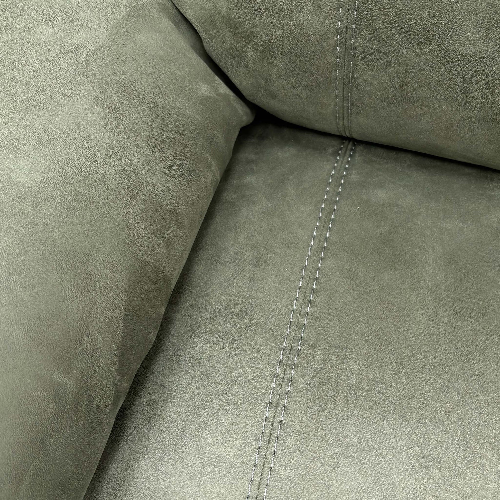 Close-up of the Olive Green suede fabric texture, highlighting the soft-touch finish and the rich, earthy green hue of the upholstery.