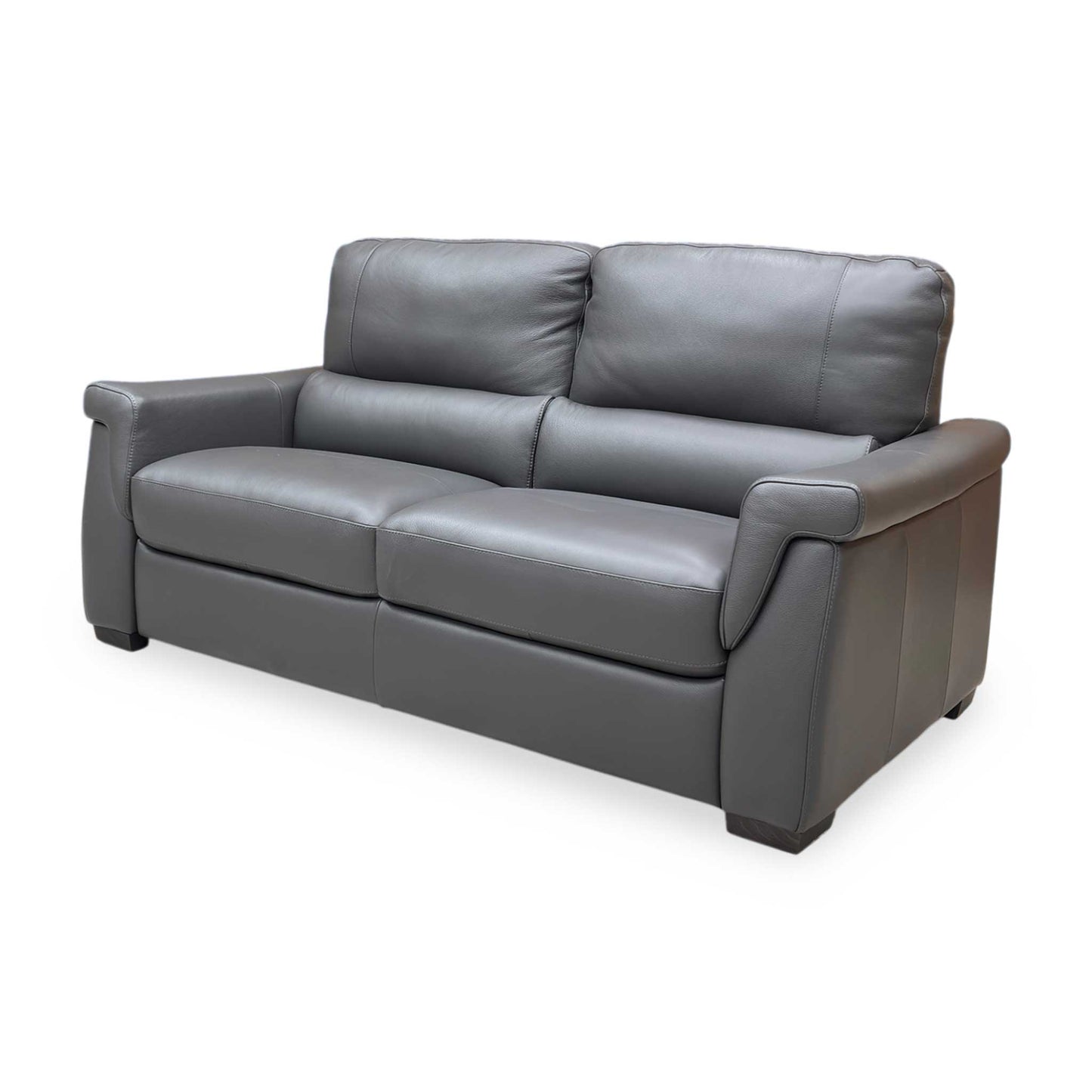 Side view of the Amore sofa in Medium Grey, showcasing the refined silhouette and smooth leather texture suitable for modern living rooms.