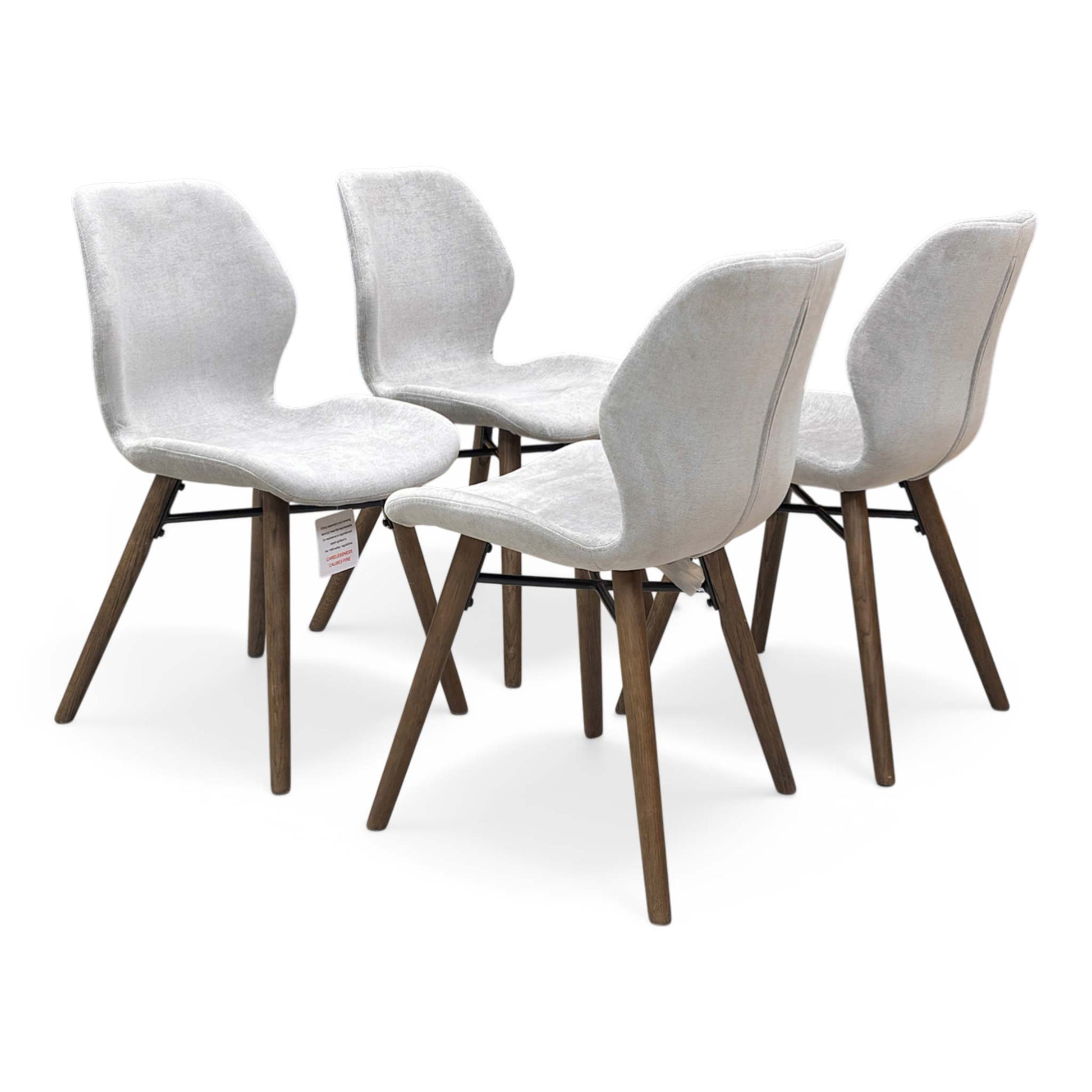 Full view of furniture Village ‘Stockholm’ set of 4 upholstered dining chairs in grey fabric with dark oak solid wooden legs.