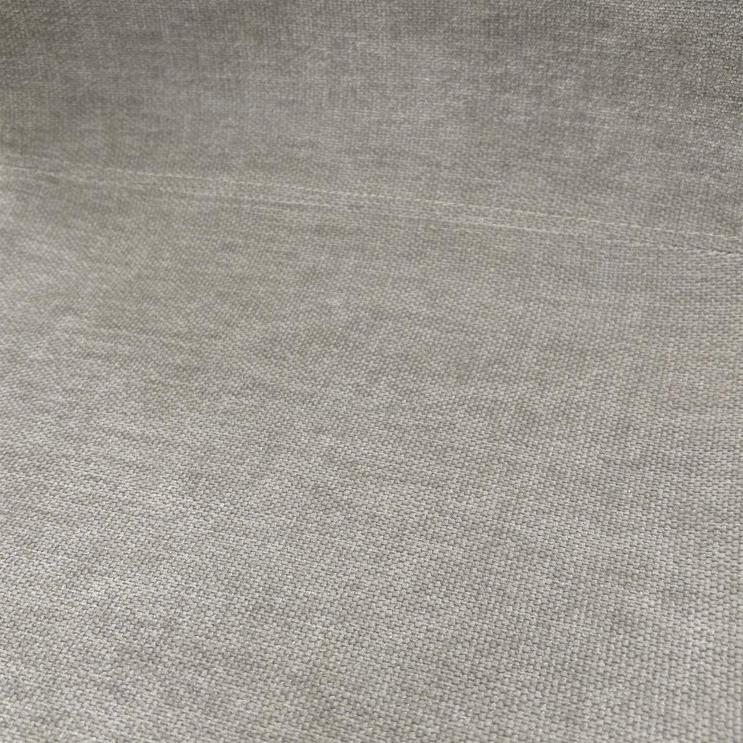 Close-up shot of the grey upholstery and solid oak wooden leg joinery, emphasizing the high-quality materials and foam cushioning.
