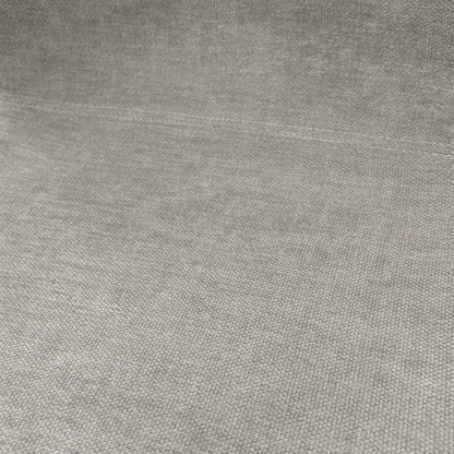 Close-up shot of the grey upholstery and solid oak wooden leg joinery, emphasizing the high-quality materials and foam cushioning.