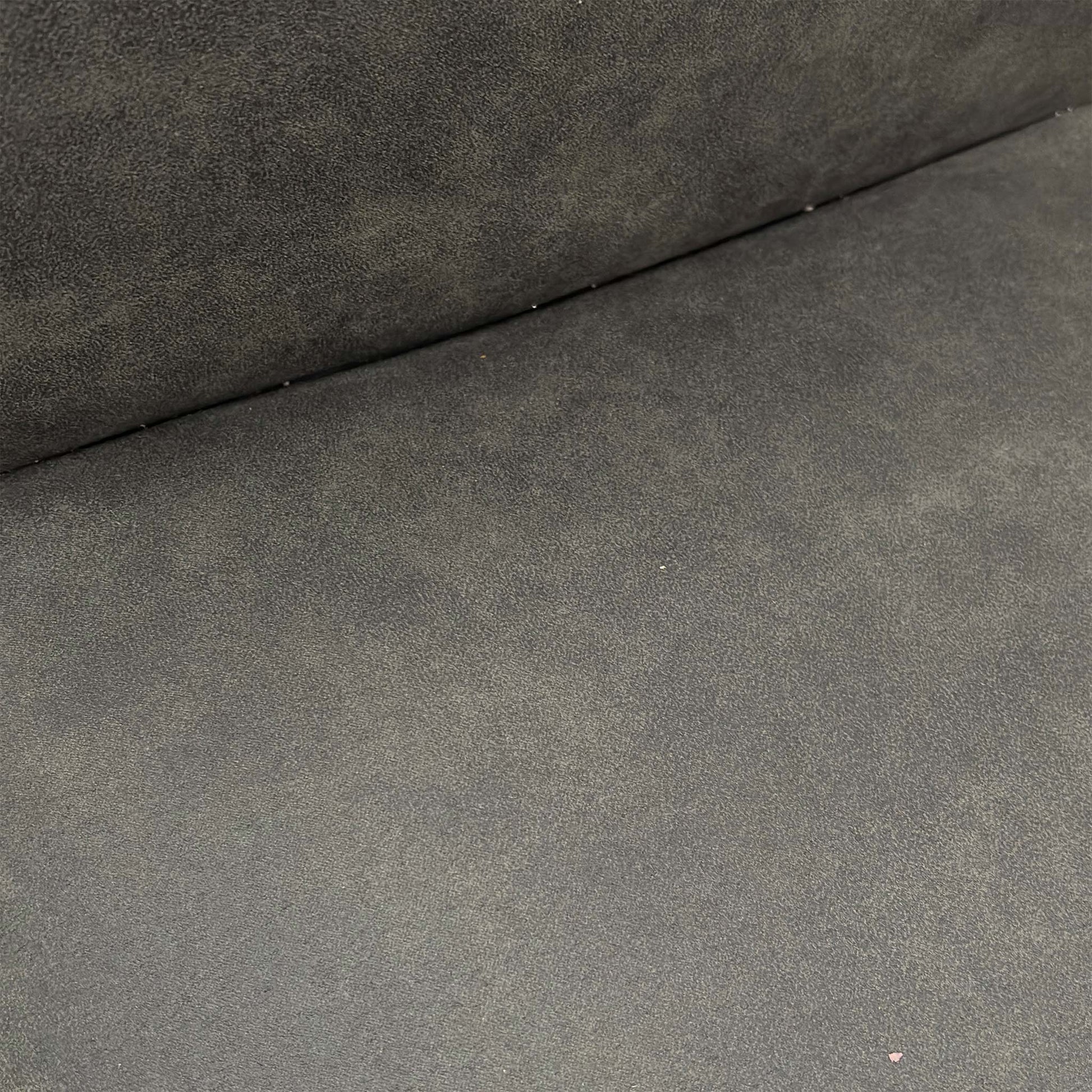 Close-up of the grey cowboy nubuck-look fabric, showcasing the soft texture and durable finish of the upholstery.