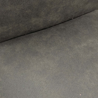 Close-up of the grey cowboy nubuck-look fabric, showcasing the soft texture and durable finish of the upholstery.