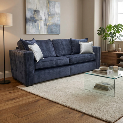 Living room view of the Chelsea 4-seater sofa, featuring soft-touch denim blue chenille and a sturdy split frame design.