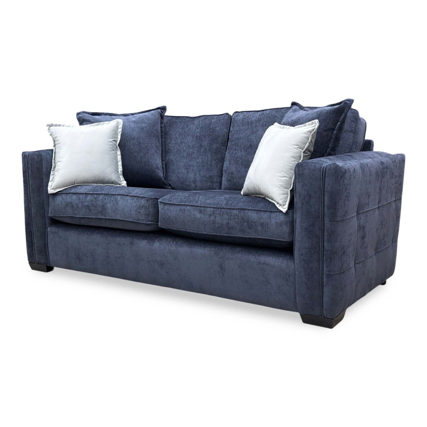 Side profile of the Chelsea 3-seater sofa, displaying the depth of the seating and the classic curved armrests.