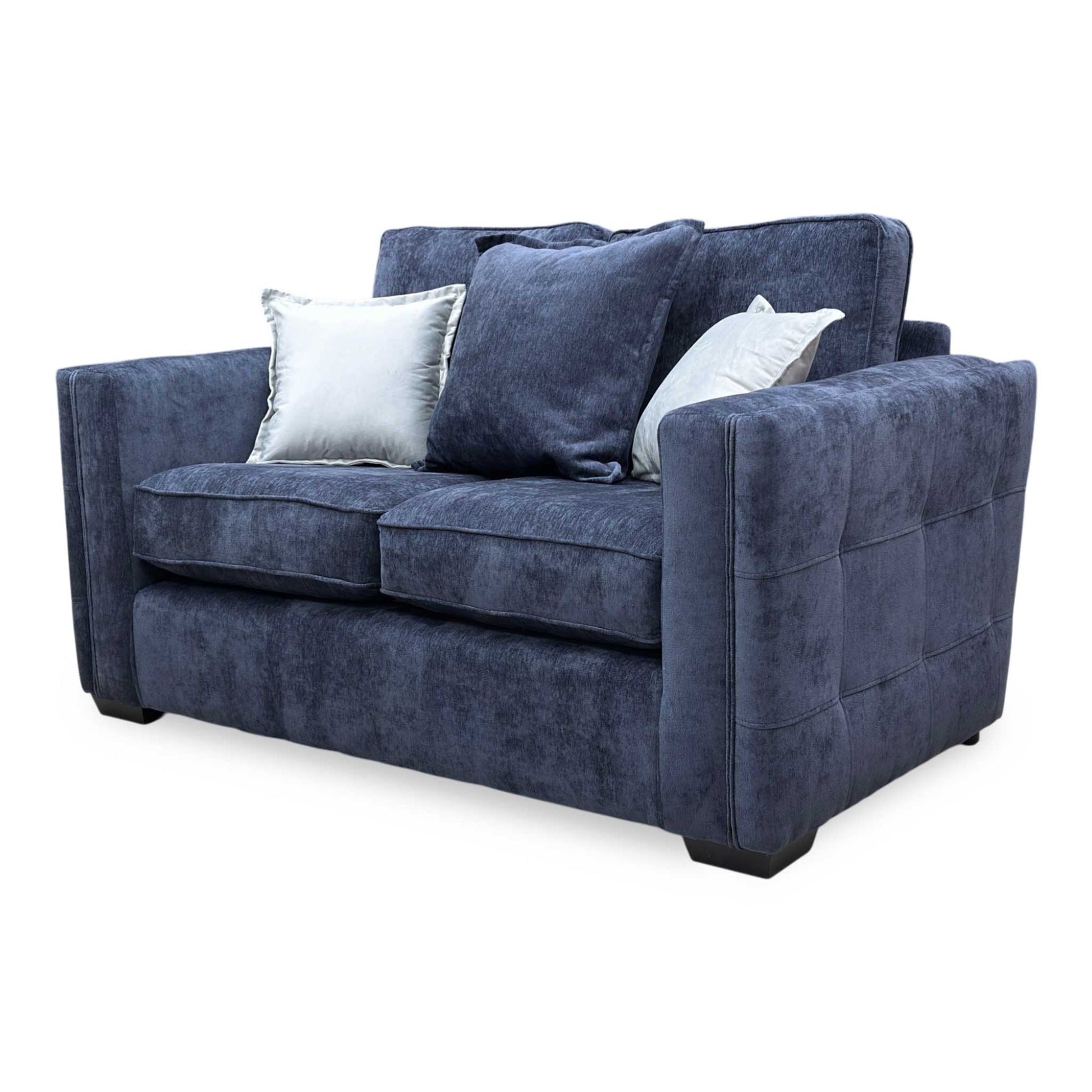 Side profile of the Chelsea sofa, displaying the depth of the seating and the clean lines of the classic armrests.