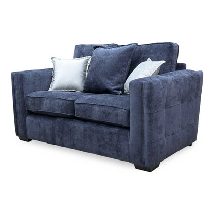 Side profile of the Chelsea sofa, displaying the depth of the seating and the clean lines of the classic armrests.
