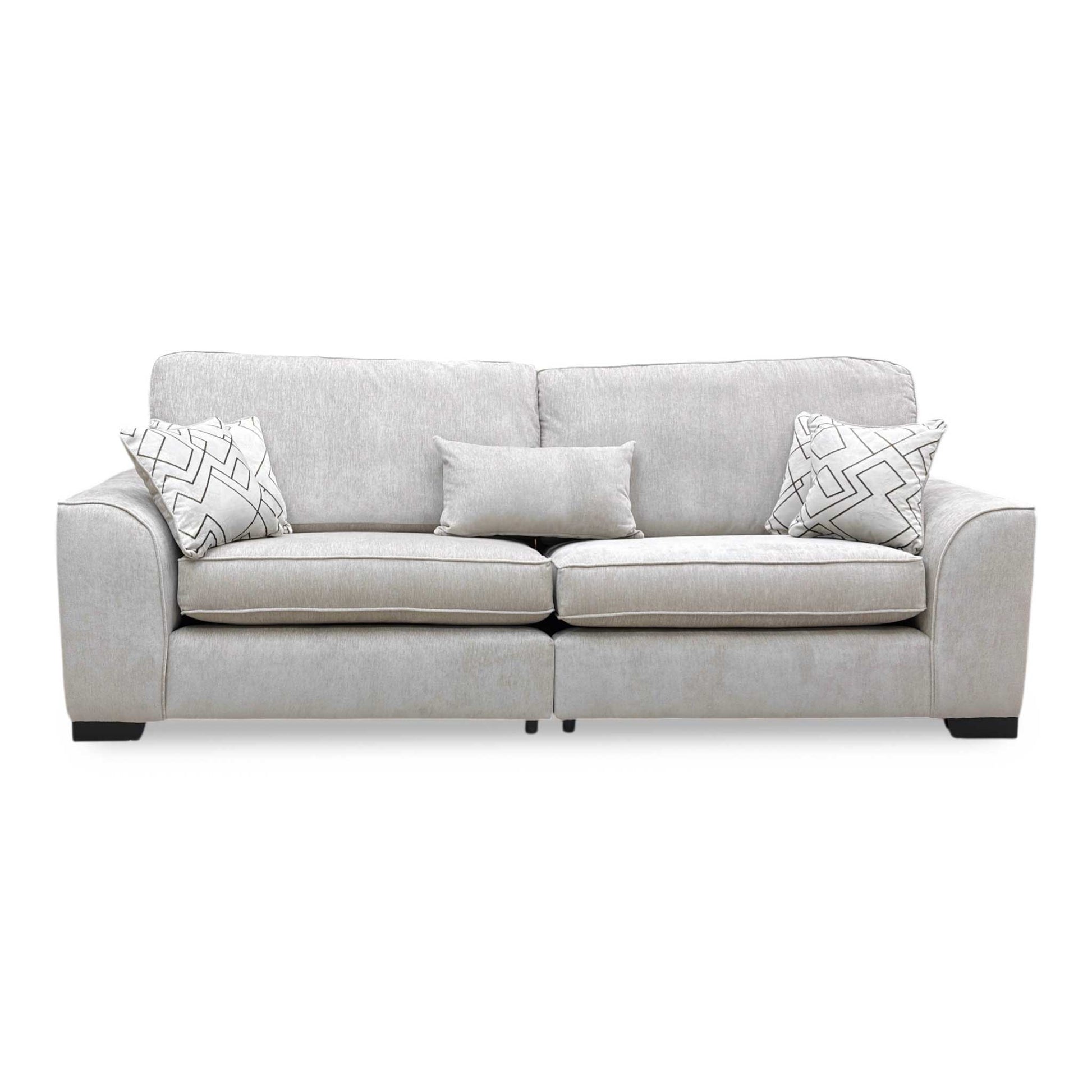 Front view of the Harvey 4-seater sofa, showcasing the neutral truffle fabric and generous seating area.