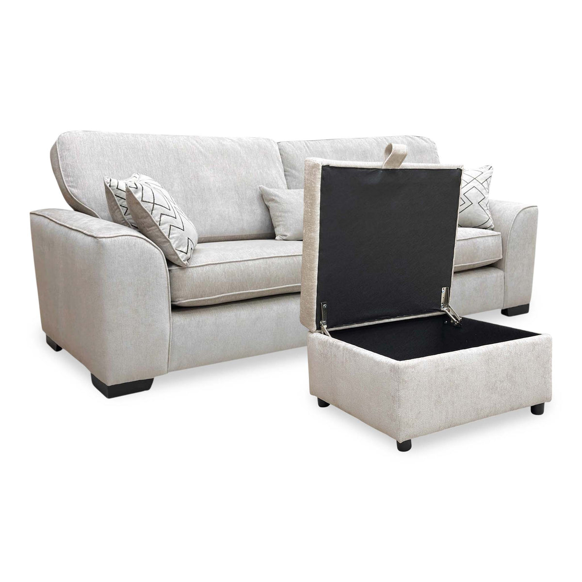 Harvey truffle 4 seater sofa with the storage footstool lid open, angled from the left
