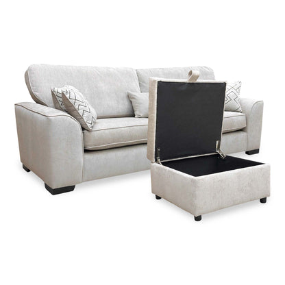 Harvey truffle 4 seater sofa with the storage footstool lid open, angled from the left