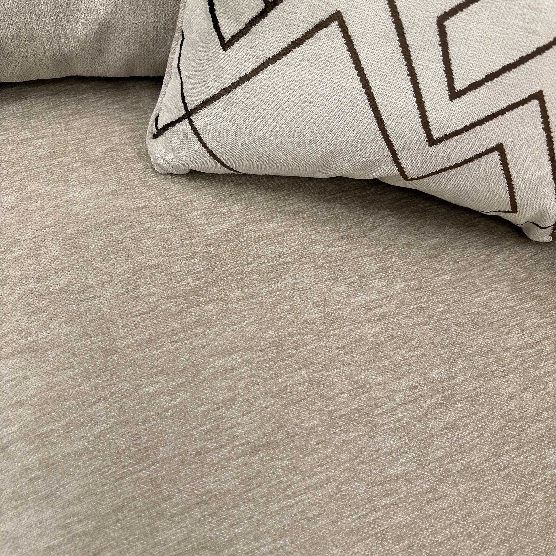 Close-up texture detail of the truffle brown Derwent soft weave upholstery.