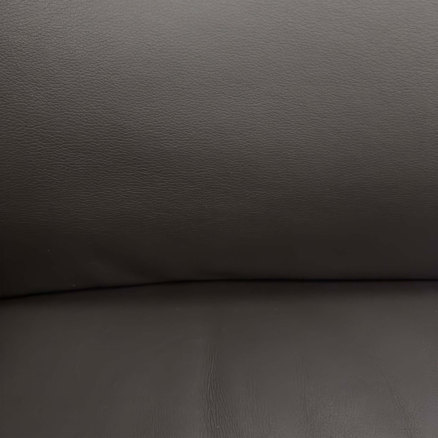 Close-up of the premium 4380 leather upholstery and detailed stitching on the backrest.