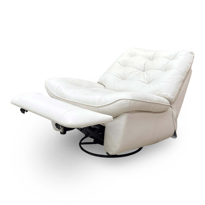 Side view showing the contemporary curved silhouette and luxurious leather cushioning.