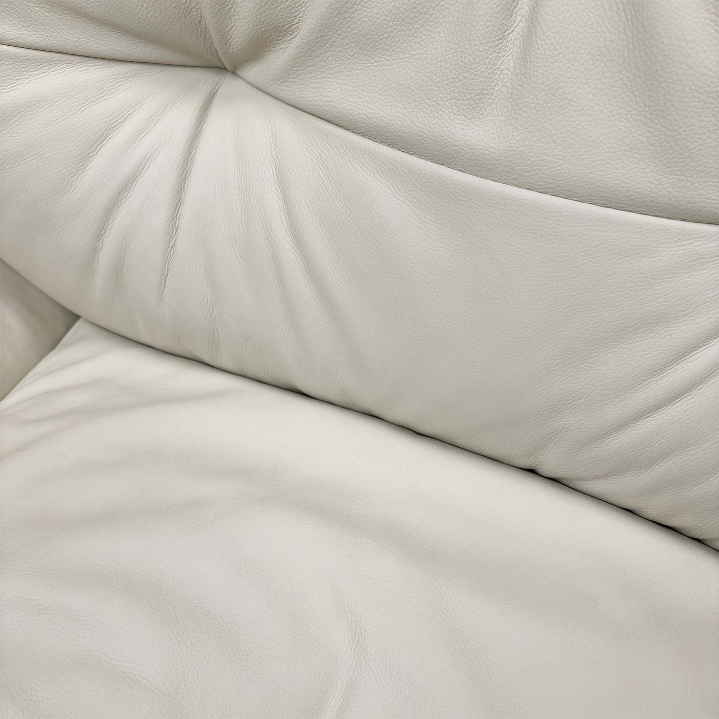 Close up shot of the premium Frost white leather texture and tailored upholstery.