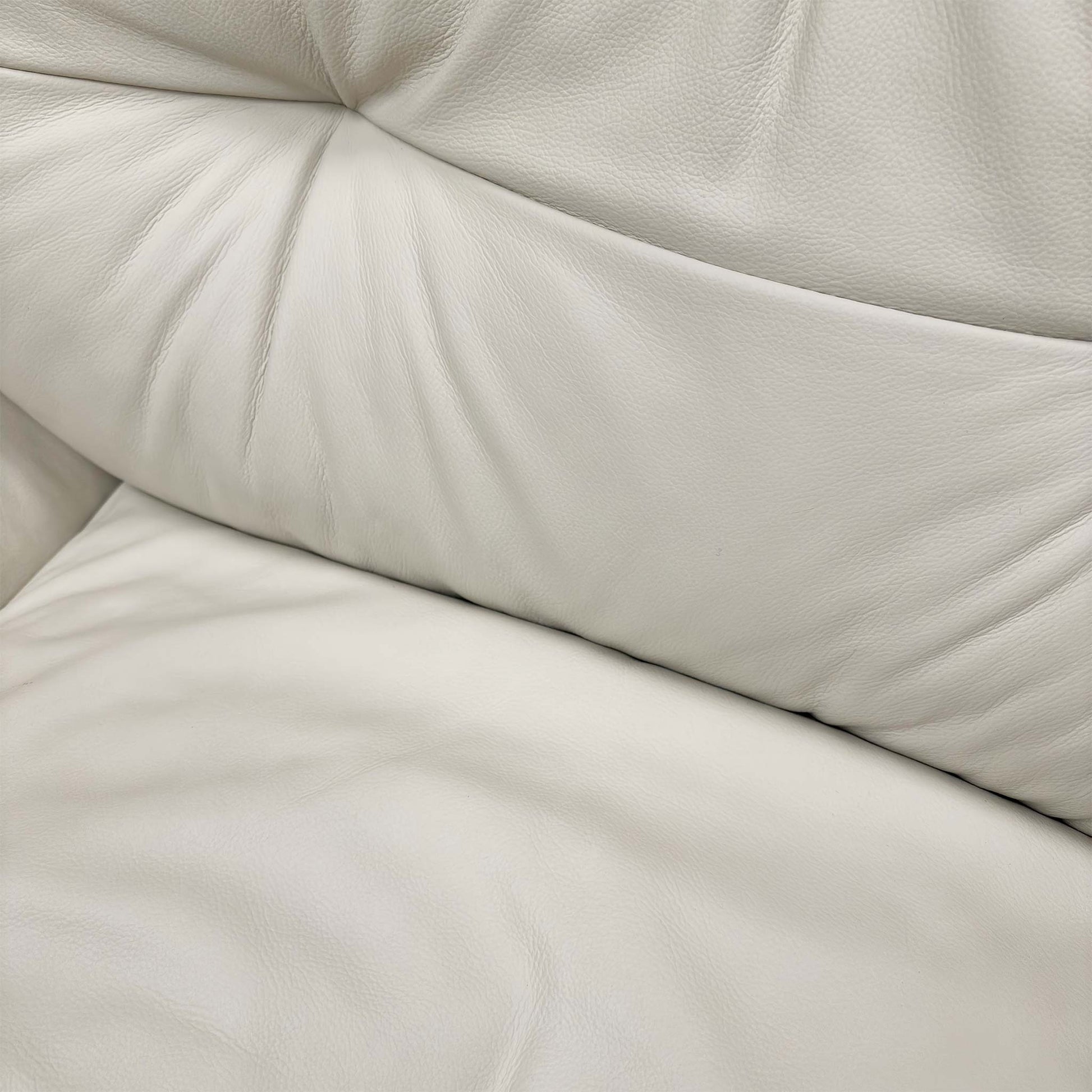 Close up shot of the premium Frost white leather texture and tailored upholstery.