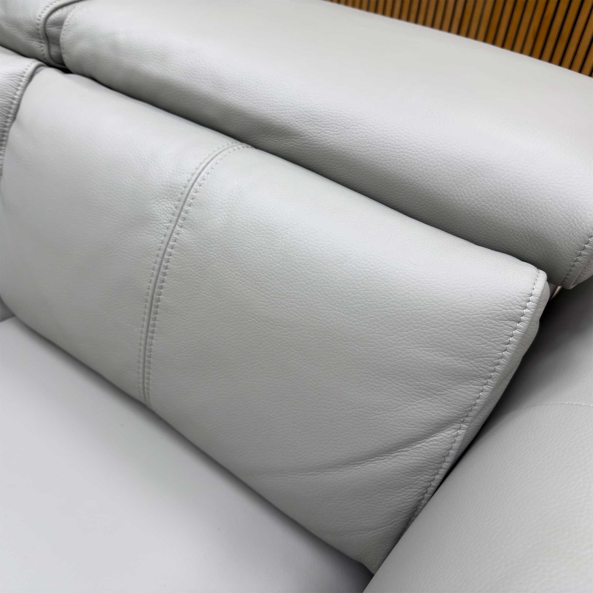 Close-up of the characterful 100% leather upholstery and precision stitching.