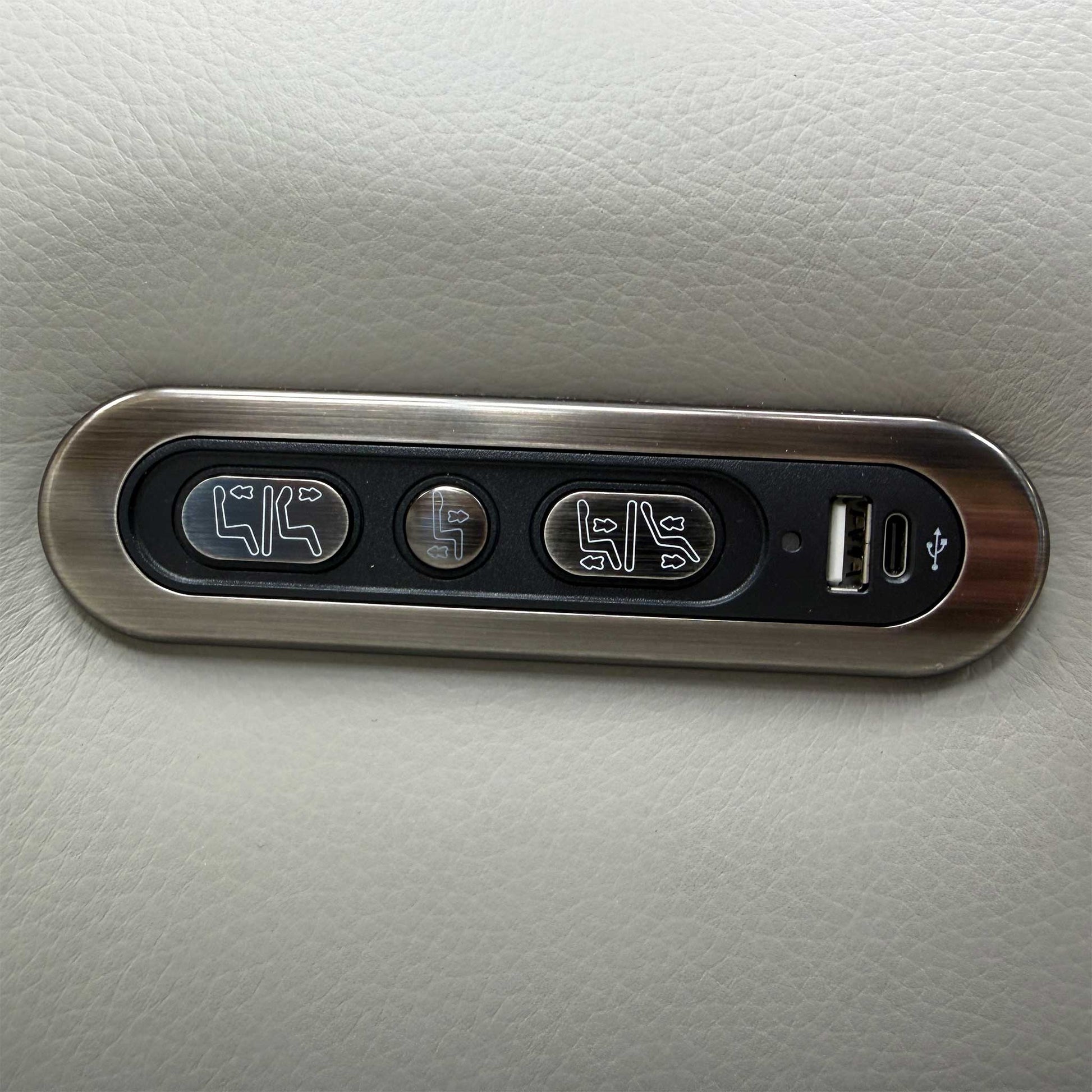 Detail view of the integrated power control panel and USB charging station.