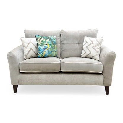 Front view shot of the high-quality linen fabric texture and reversible fiber-filled back cushions.