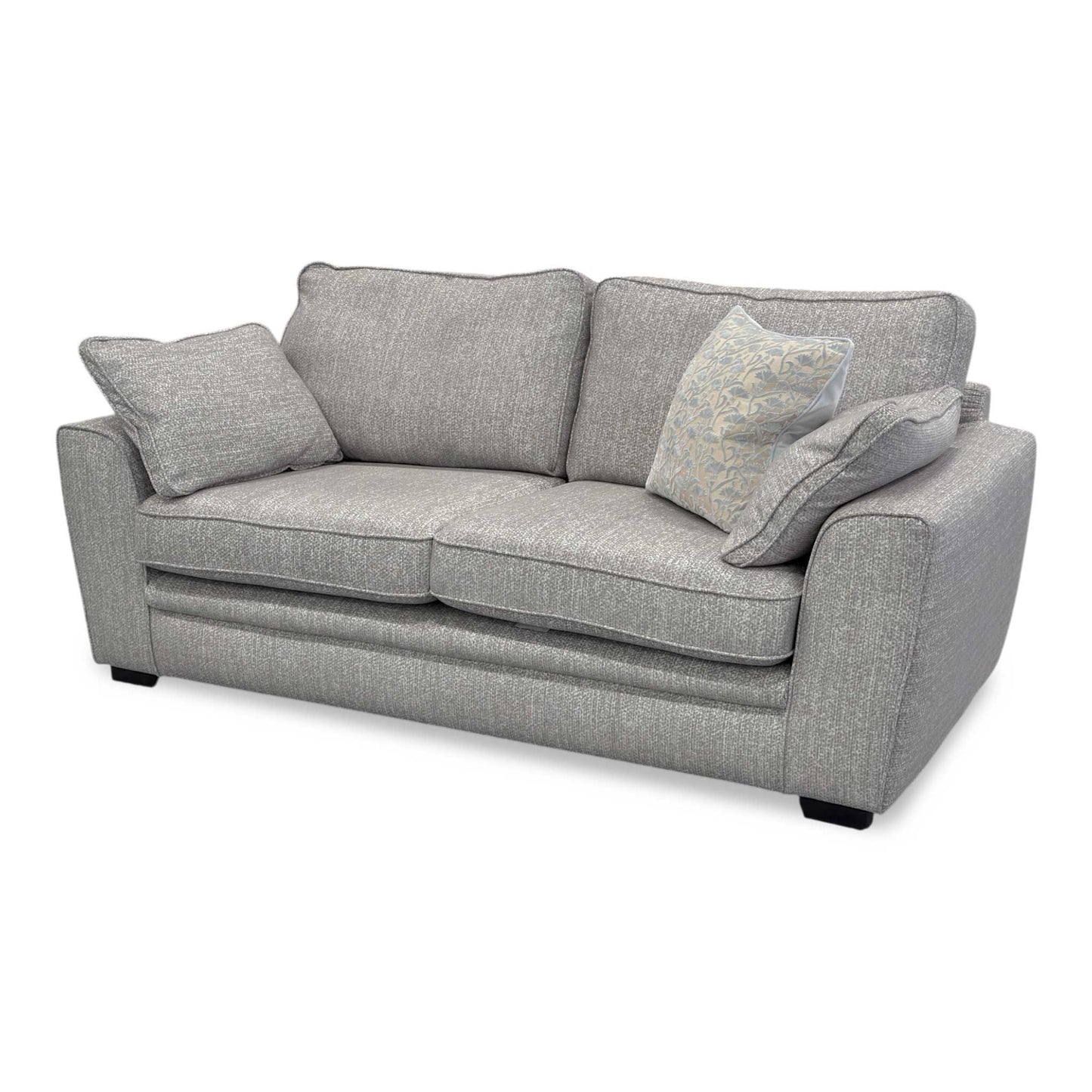 Side shot of the Chalfont sofa, highlighting the elegant flared armrests and the depth of the comfortable back cushions.